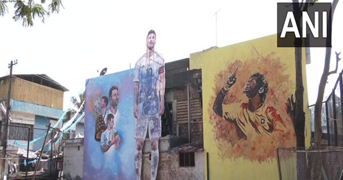 Kerala: Daily wage workers paint their colony to celebrate FIFA WC
